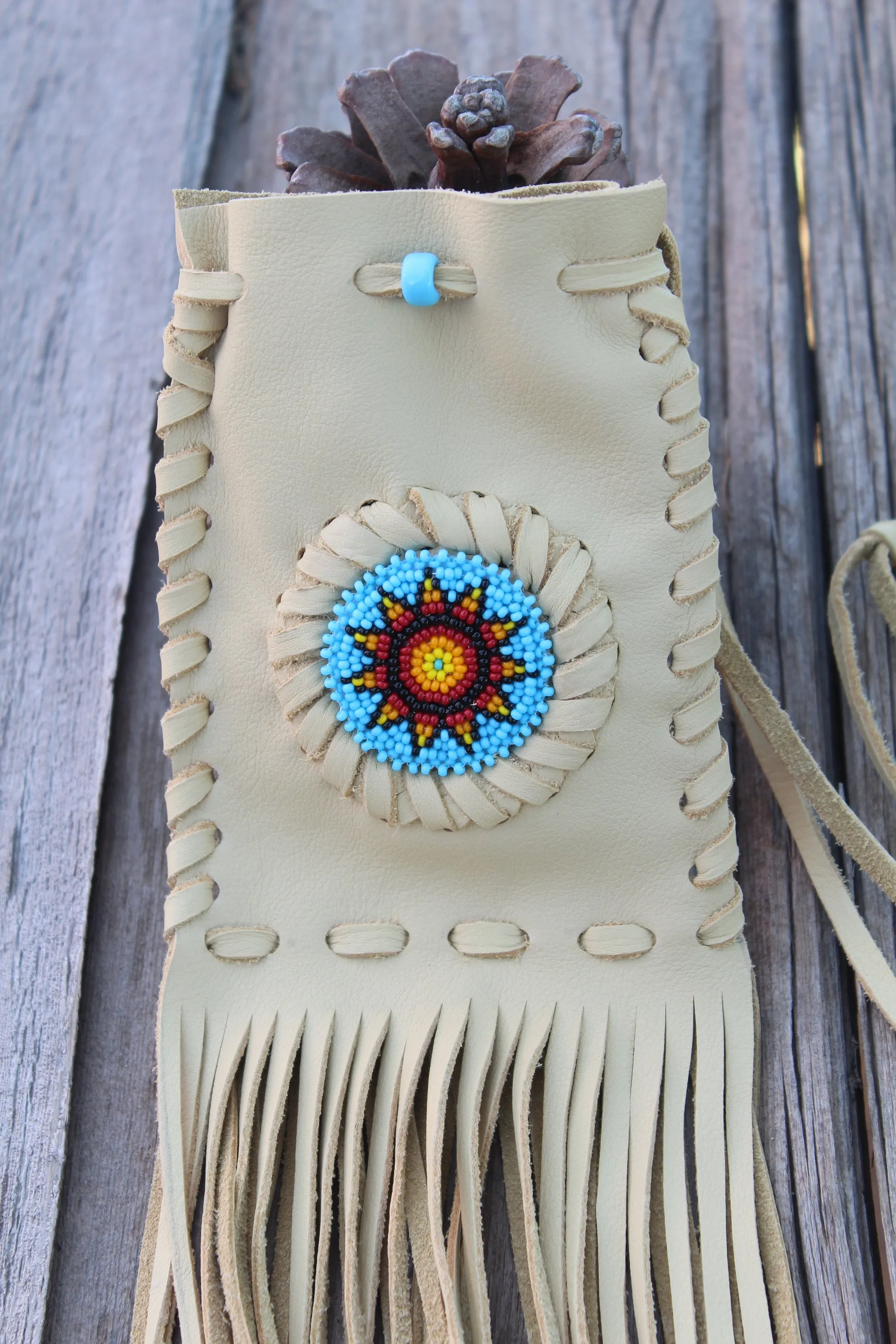 Beaded fringed medicine bag, beaded leather pouch