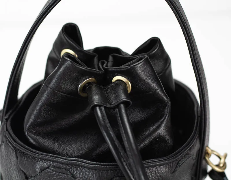 Helon mini bucket bag - Handwoven black leather